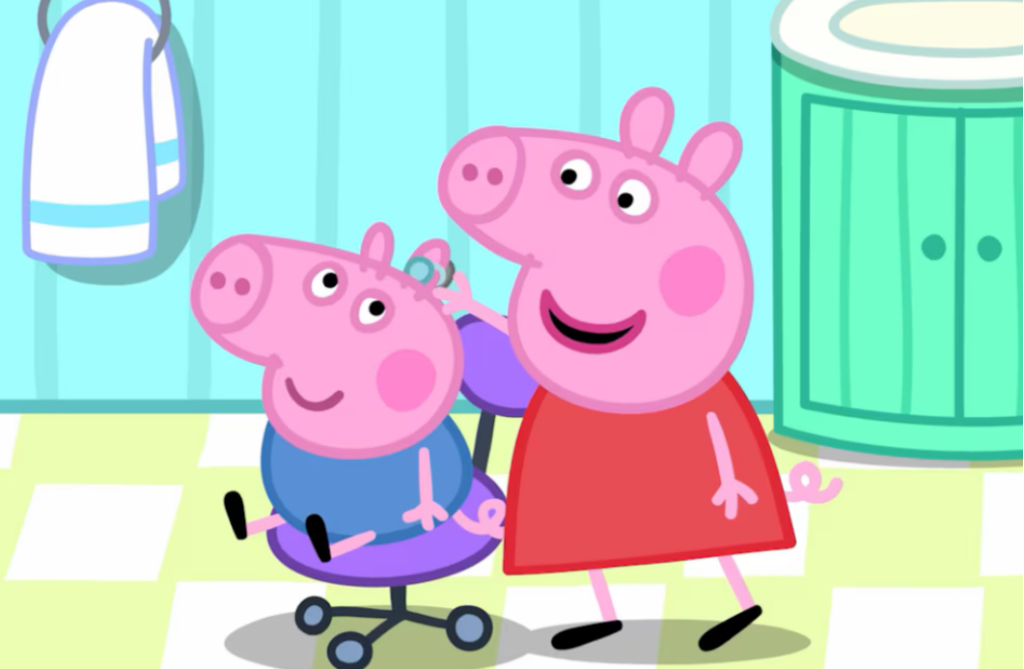 George y Peppa Pig sentados