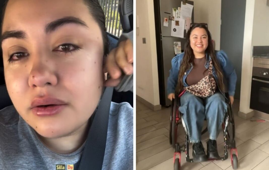 Mujer llorando y en silla de ruedas